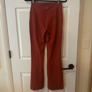 lululemon athletica flare Yoga Pants rust color